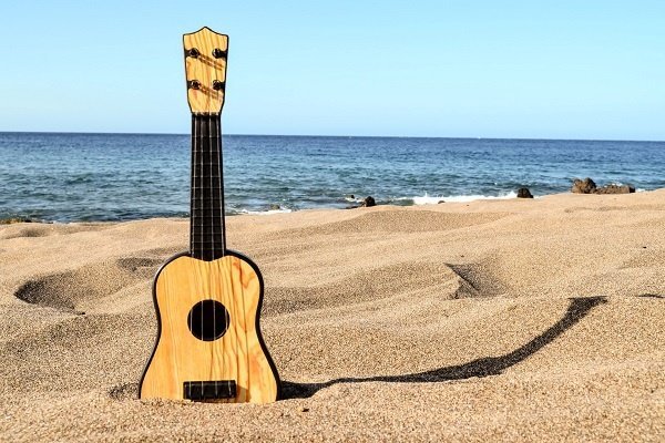 Guitar In The Sand 571709050 Downscale 2