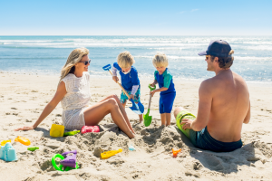 Family on the beach with Sand Toys
