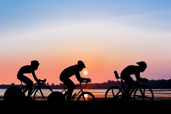 Bike Cyclists Silhouettes At Sunrise Md Coastbikefestival