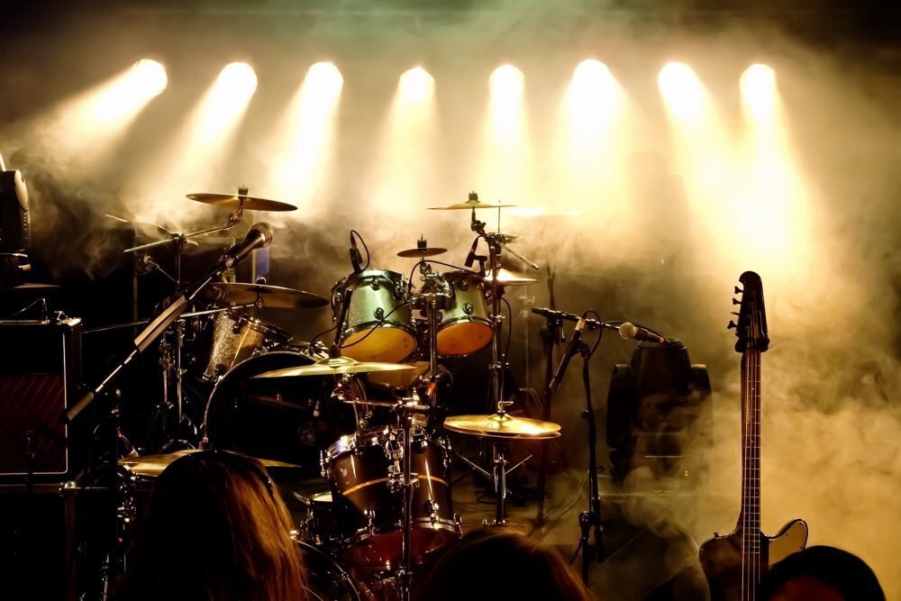 Band Equipment Set Up On Stage Lights Focused Down With Smoke Downscale 1